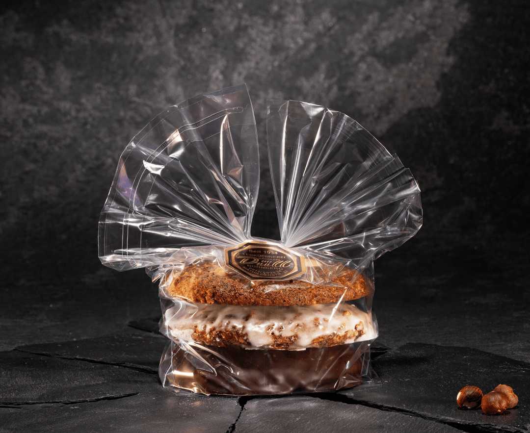 3er Packung Elisnen Lebkuchen Düll, Feinkost schmitz, auf einer Schieferplatte