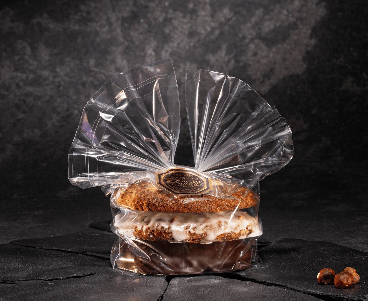 3er Packung Elisnen Lebkuchen Düll, Feinkost schmitz, auf einer Schieferplatte