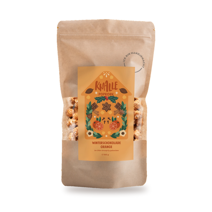 Knalle Popcorn Winterschokolade Orange in der Tüte im Weihnachtsdesign - Feinkost Schmitz